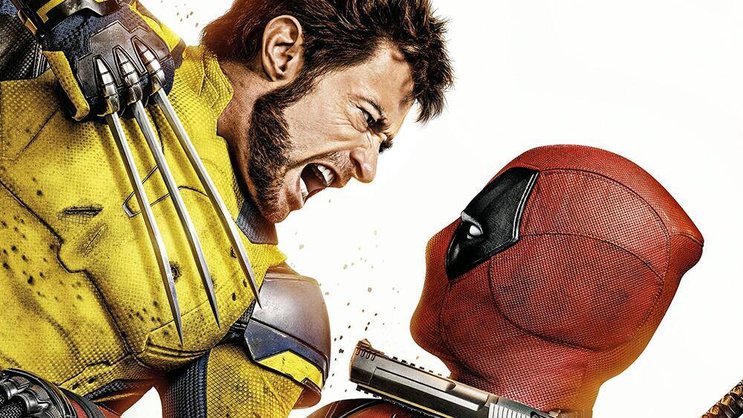 Wer trägt’s besser? Reynolds und Jackman in ikonischen Kostümen.